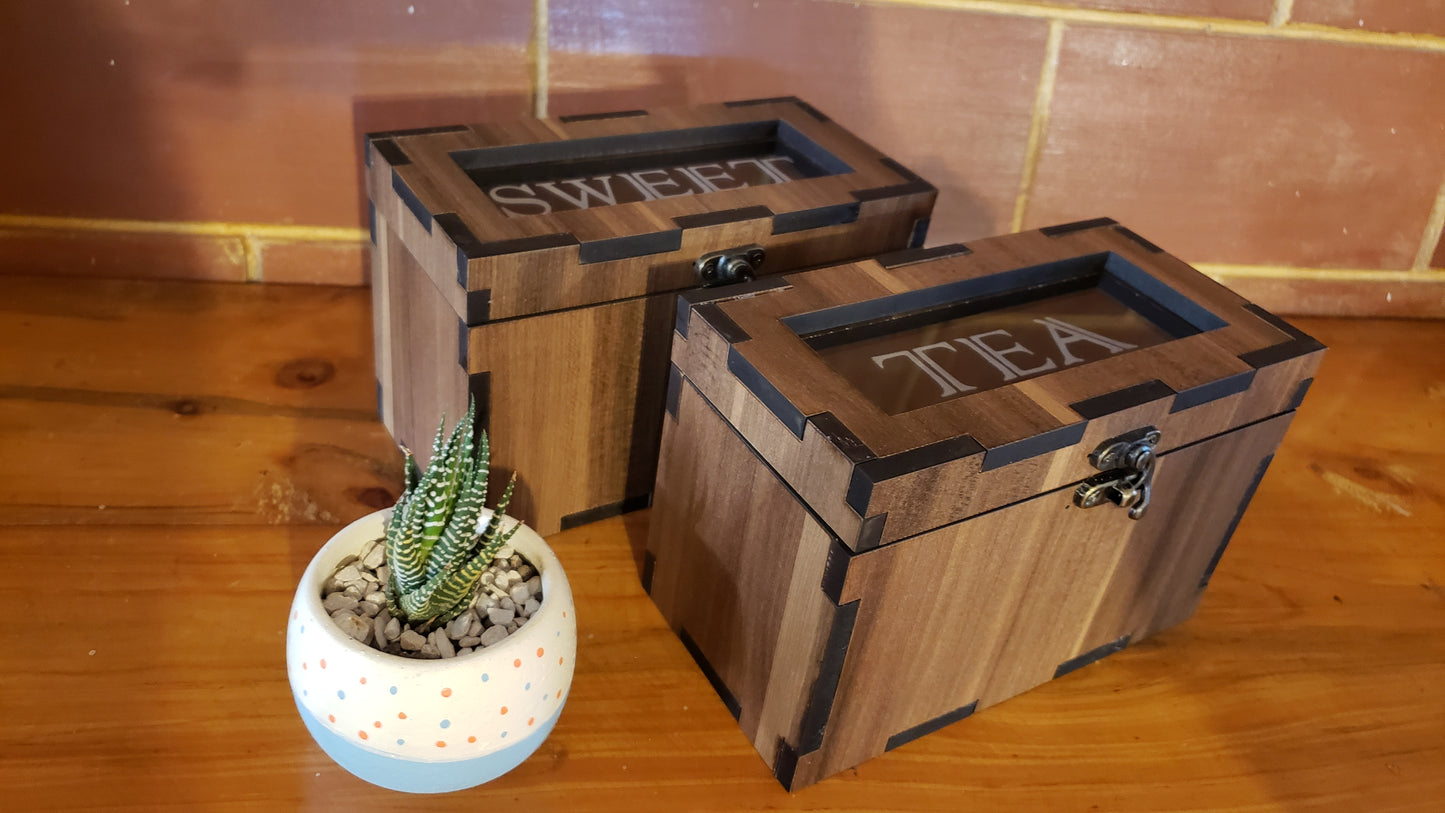 Cajas de té y azúcar
